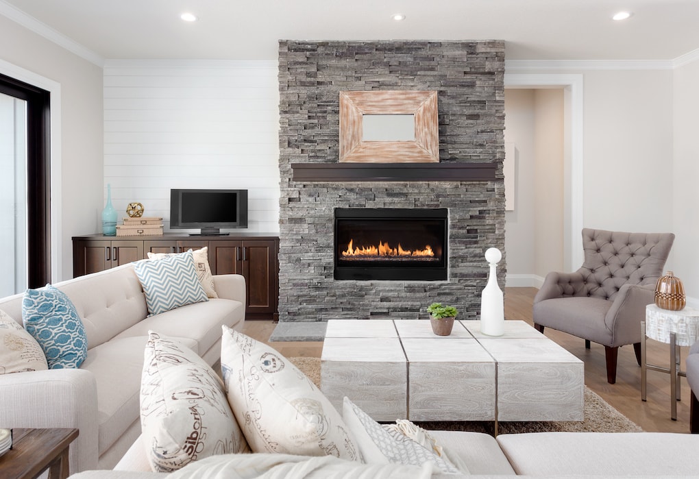 adding a fireplace is one of the most popular living room remodel ideas 