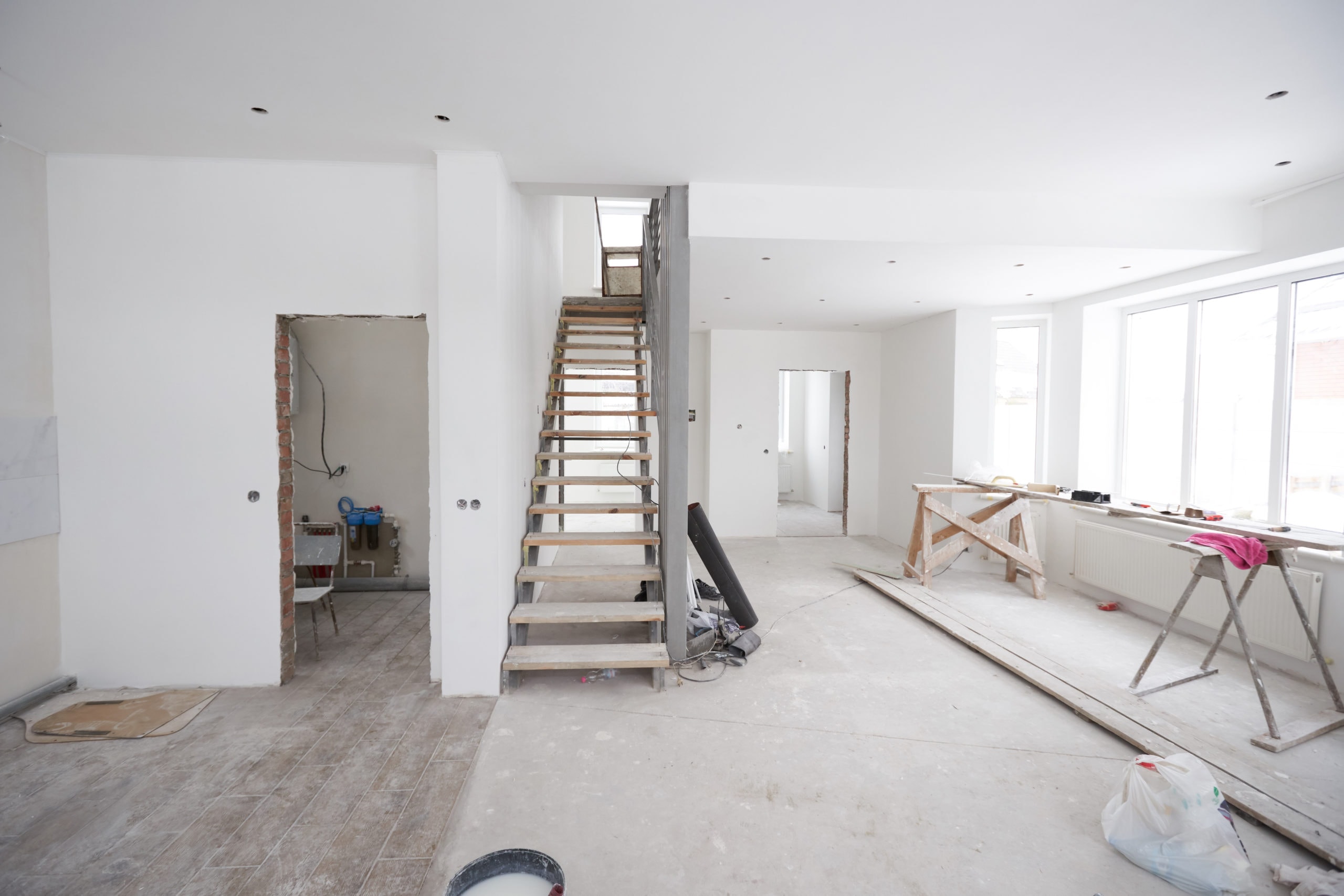 home remodel vs renovation: unfinished stairway