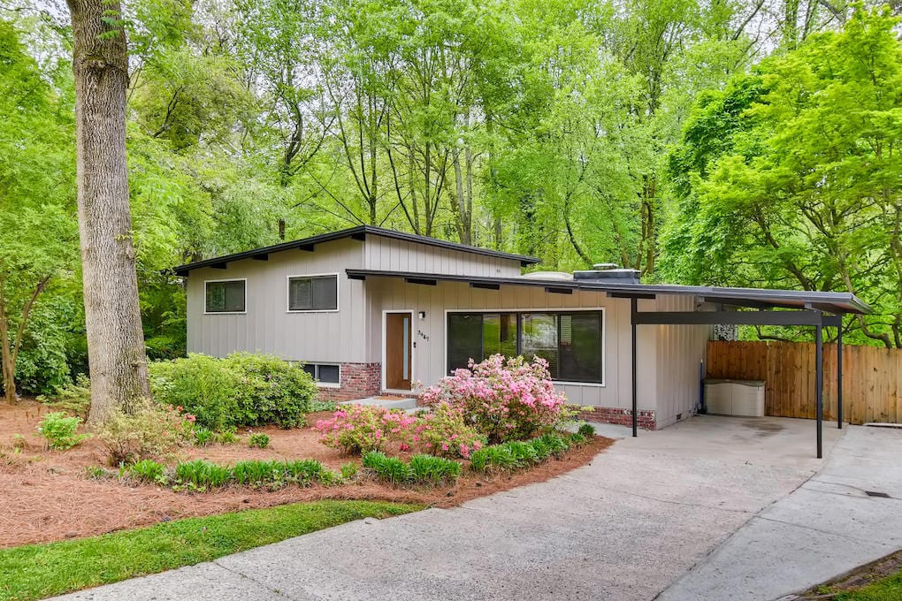 midcentury modern antique home in woods 