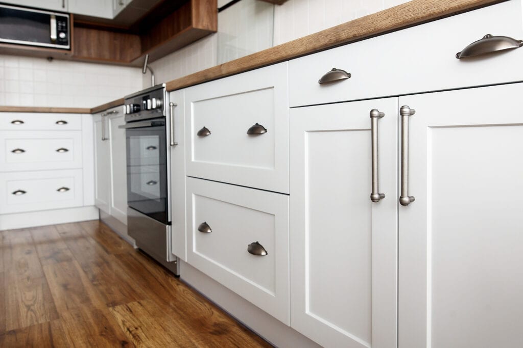 white kitchen cabinets with brushed nickel hardware